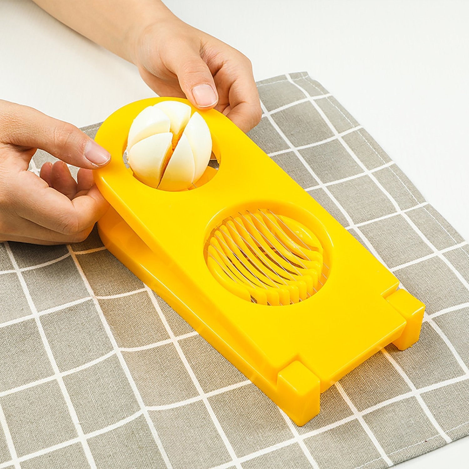 2006 2 in 1 Double Cut Boiled Egg cutter with stainless steel wire for easy slicing of boiled eggs. 